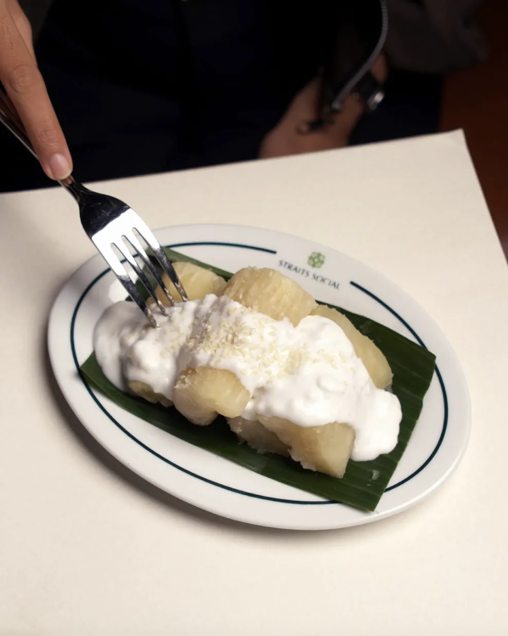Sweet tape with coconut sauce on a banana leaf